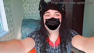 The sissy crossdresser in sexy dress rides cowgirl.