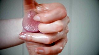 Amateur slowly lubes big cock for intense handjob cumshot