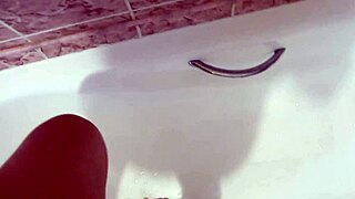 Hey, wanna watch this milf pissing close-up in bath?