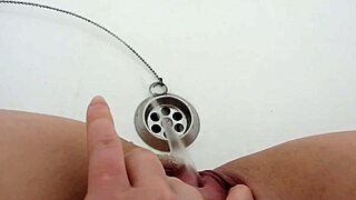 Hey, wanna watch this milf pissing close-up in bath?