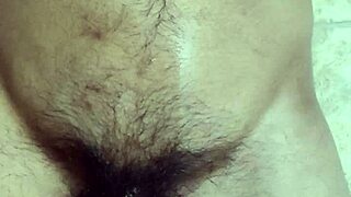 gay guy plays with his belly and cums