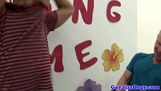 Muscular hunks intensely receiving blowjobs in orgy.