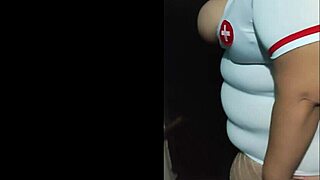 Hey, who’s this busty milf nurse at Halloween 2023 party?!