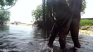 Skinny ebony hottie bathes in river while getting fucked