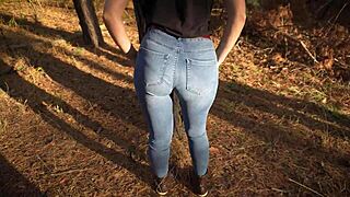 hot milf teases her amazing ass in tight jeans in the forest