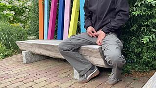 Exploring the thrill of outdoor exposure in a bustling public park