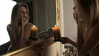 Kisa Angel, a petite blonde teen, performs a seductive strip dance with clothes ripped.