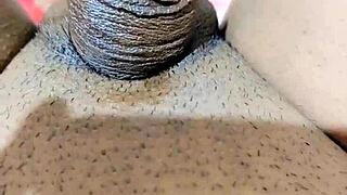 Hey, watch her rub that limp clitty and piss wildly!