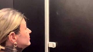 Got horny at gym training, rushed to bathroom for wet pussy masturbation. Intense orgasm follows in public outdoor scene.