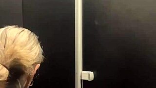 Got horny at gym training, rushed to bathroom for wet pussy masturbation. Intense orgasm follows in public outdoor scene.