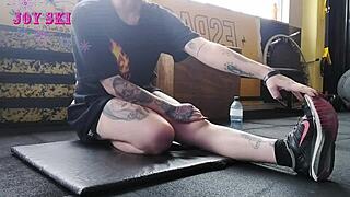 Alternative Girl Stretches At The Gym.