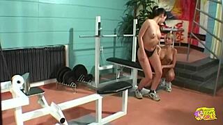 Busty blonde lesbian spices up workout with brunette using thick strapon