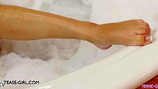 I interview the delightful young brunette model in the bath