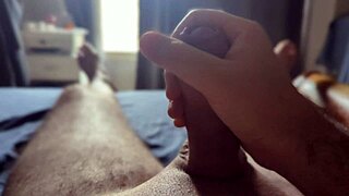 Masturbating Big Cock Close Up In Bedroom With Sun Rays Shining Through Window