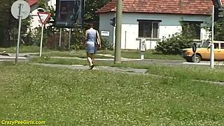 Redhead BBW Milf Caught Peeing in Public with Her Big Tits Bouncing in Outdoor Reality Scene.