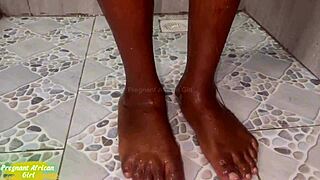 Oh man, this pregnant african girl is squirting with a big black cock. She's 8 months gone!