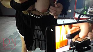 halloween witch regina noir with pumpkins on stairway