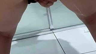 Teen bends over to pee in bathroom with juicy flow