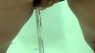 Teen bends over to pee in bathroom with juicy flow