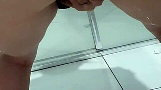 Teen bends over to pee in bathroom with juicy flow