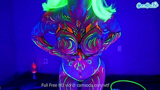 jewelz blu performs body painting and masturbation with dildo.