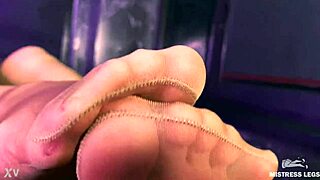 beautiful mistress teases with feet and ass in flesh-colored pantyhose