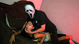 Neighbor in ghostface costume on halloween night