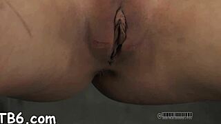 In rope bondage, she sucks cock and gets her cunt wet.