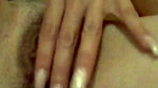 Wife intensely fingers her shaved pussy in secret