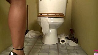 yo, angelica jerks off a huge cock on the toilet!