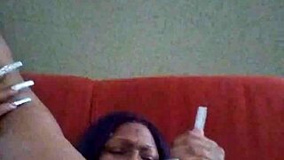 Ebony Woman Making Herself Creamy with Hairy Pussy