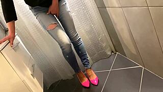 Desperate blonde milf pees in her jeans, then he pees on her ass, and she gives him a blowjob.