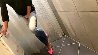 Desperate blonde milf pees in her jeans, then he pees on her ass, and she gives him a blowjob.