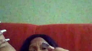 Ebony Woman Making Herself Creamy with Hairy Pussy