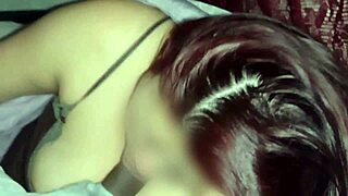 Watching movies with my neighbor while I suck his tasty cock in secret