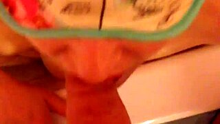 Submissive slut sucks and swallows in shower.