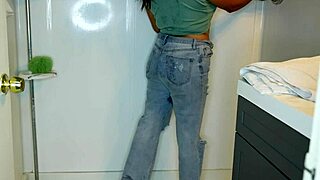 latina babe wets her pants and panties, then strips and showers messily