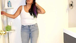 latina babe wets her pants and panties, then strips and showers messily