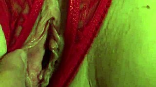 Shaved pussy in red thongs gets wet from fingering. Can't stop touching myself!