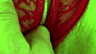 Shaved pussy in red thongs gets wet from fingering. Can't stop touching myself!