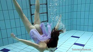 Aneta big tits in purple dress by pool