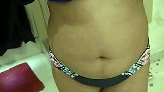 Curvy Ebony Student Teases in Hotel Bathroom Shorts