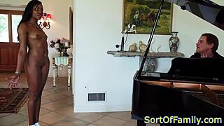 black stepdaughter bent over doggystyled by piano