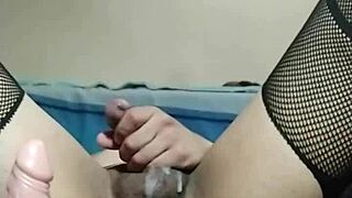 in this scene, the transsexual ladyboy rides her dildo in lingerie, cumming hard.