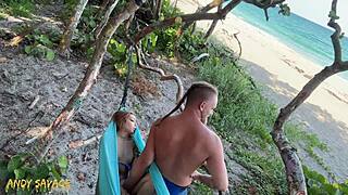 Hey, wanna see public fingering action at the beach?