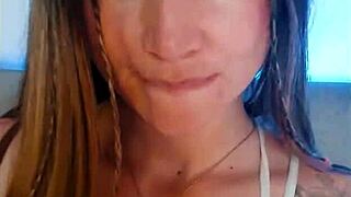 I watch this tattooed babe finger herself madly