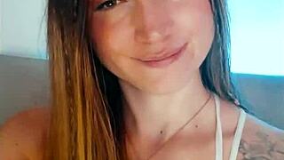 I watch this tattooed babe finger herself madly