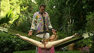 red head milf fucks outdoors in heels, getting a cumshot facial on her big cock