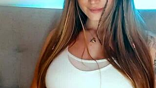 I watch this tattooed babe finger herself madly