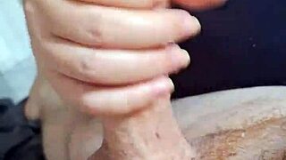 Asian teen jerks off friend in uncensored handjob